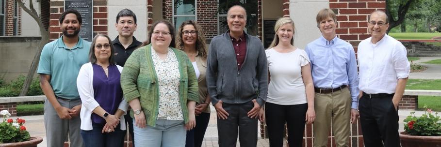 Isaac Wanasika, Maurice Harris, and Jeri Lyons Win pose with their fellow researchers.